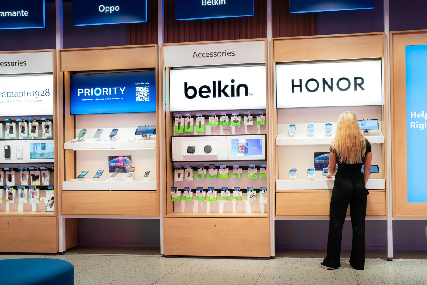 A shopper browsing in-store product and campaign displays